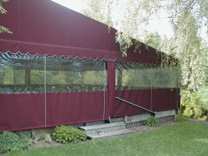 Stationary deck canopy with clear side wall enclosure