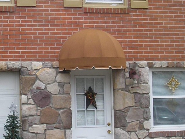 Round door hood awning