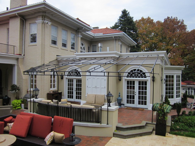 Rounded front patio deck awning canopy. Welded trusses. Black powder coated frame. Custom awning