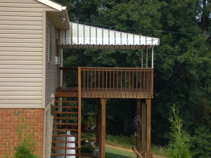 Roof mount stationary canopy on a deck