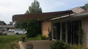 Patio awning provides shade and cools inside home