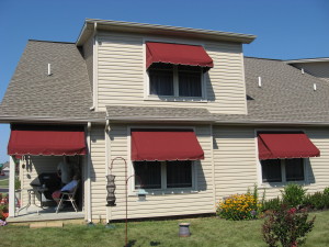 resdidential shed style porch and window awnings