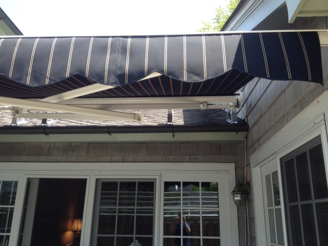 Little - Big Retractable awning mounted on a roof