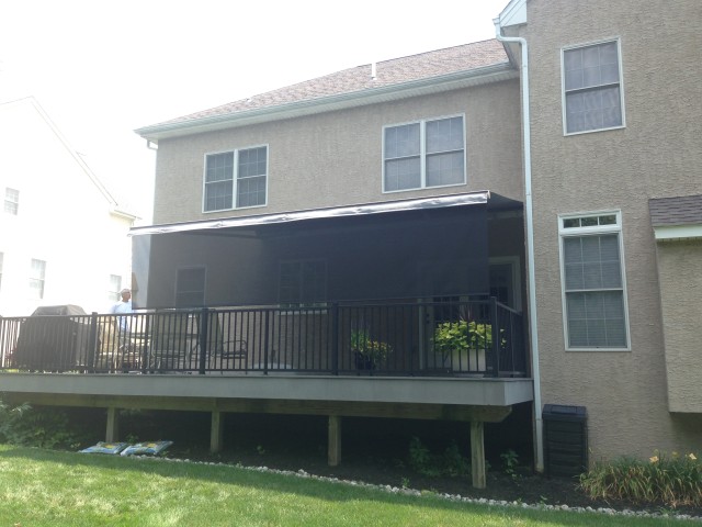 Eastern Retractable awning with a drop screen