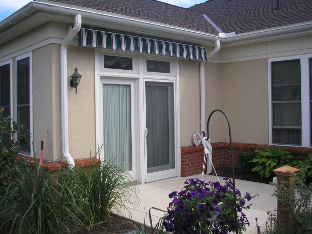 Little - Big retractable awning installed using soffit brackets