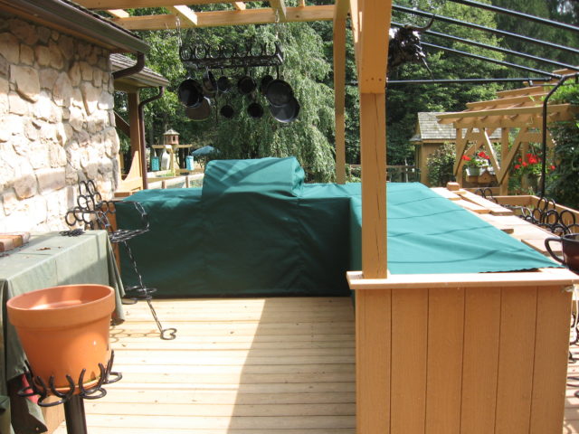 Custom grill and kitchen cover for outdoor patio area