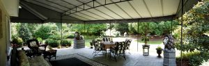Large fixed awning installed over a patio