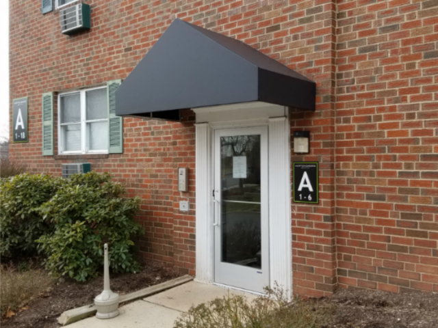Awning installed over an apartment door