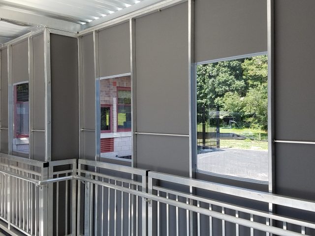 Walkway enclosure panels