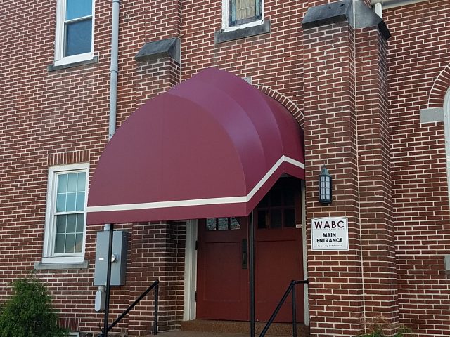 Church entrance canopy over stairs at WABC