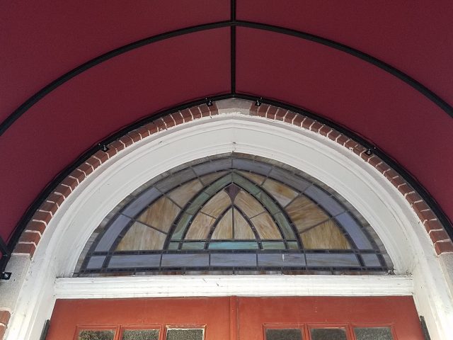 Church entrance canopy over stairs at WABC