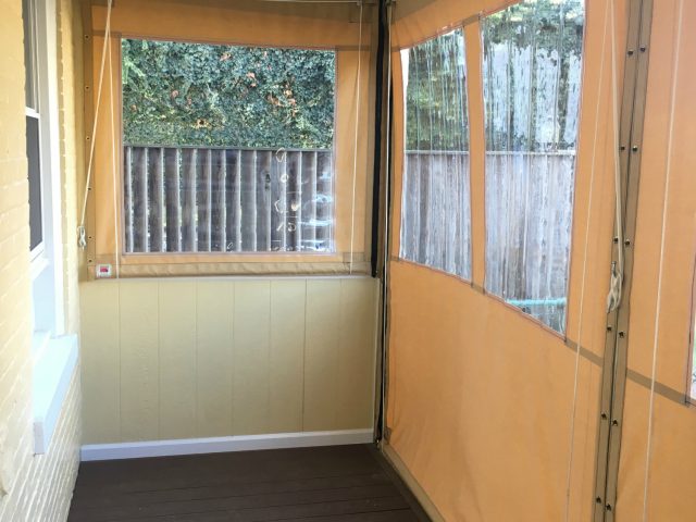 Clear Vinyl Drop Curtains on a porch - zippered door - Sunbrella fabric - 20 gauge double polished clear vinyl
