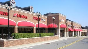 Commercial facade awnings - Red Sunbrella fabric
