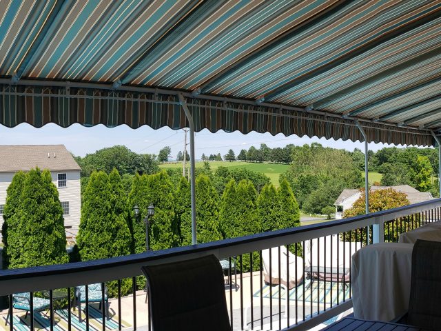 Poolside canopy shade - powder coated frame - manheim pa - striped sunbrella fabric - wave scallop-----