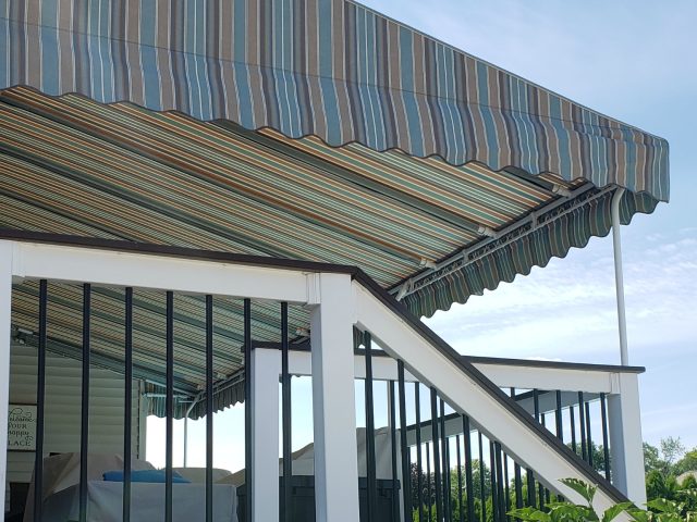 Poolside canopy shade - powder coated frame - manheim pa - striped sunbrella fabric - wave scallop