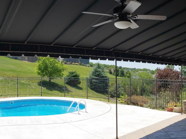 Relax by the pool - stationary canopy awning - black sunbrella fabric - powder coated frame - shade - canvas lancaster pa