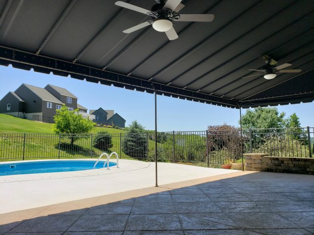 Relax by the pool - stationary canopy awning - black sunbrella fabric - powder coated frame - shade - canvas lancaster pa - black