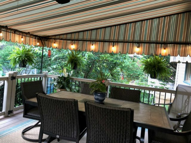 Relax outside under your own stationary canopy - stay cool and dry - sunbrella fabric awnings - lancaster manheim Pa -
