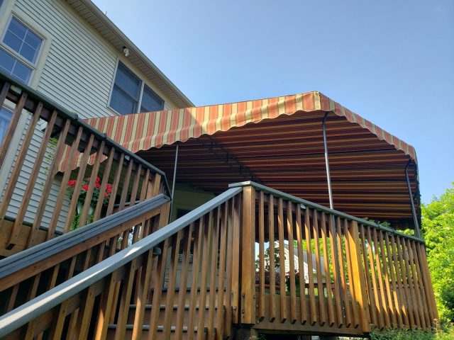 striped sunbrella fabric canvas awning stationary canopy outdoor living room lancaster lititz