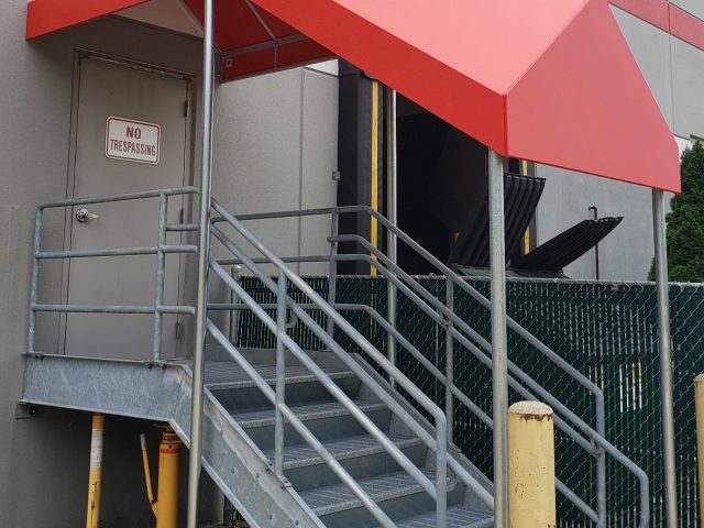Entrance canopy over stairs on a commercial building 