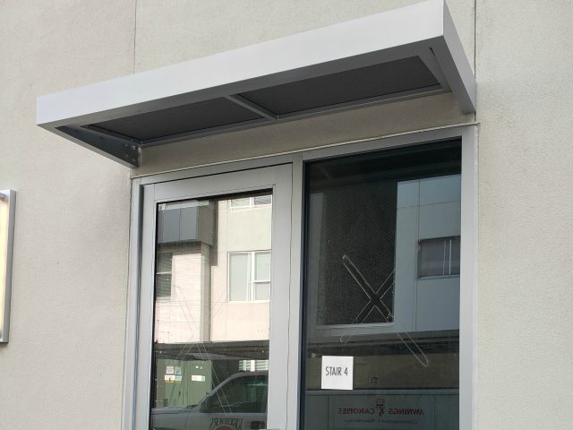 Hanover King of Prussia - Flat panel aluminum and fabric awning - modern style entrance canopy - straight lines - Lancaster PA