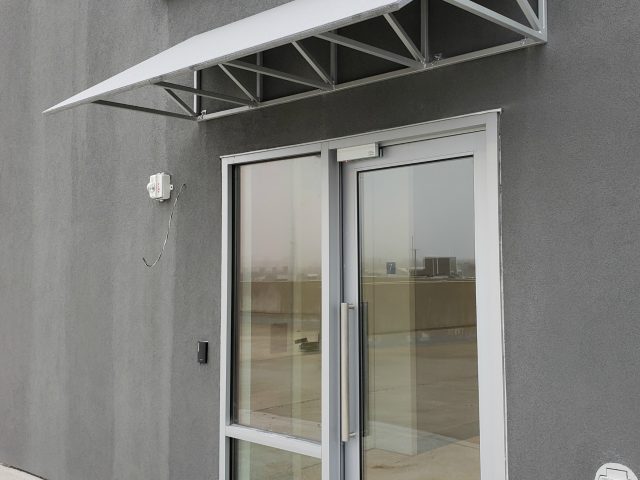 King of Prussia - Hanover Apartments - Parking garage awnings - Sunbrella fabric - door hood