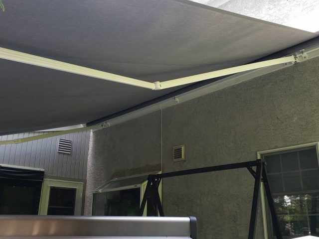 Retractable deck awning sunbrella fabric malvern lancaster pa patio cover----Kreiders canvas service