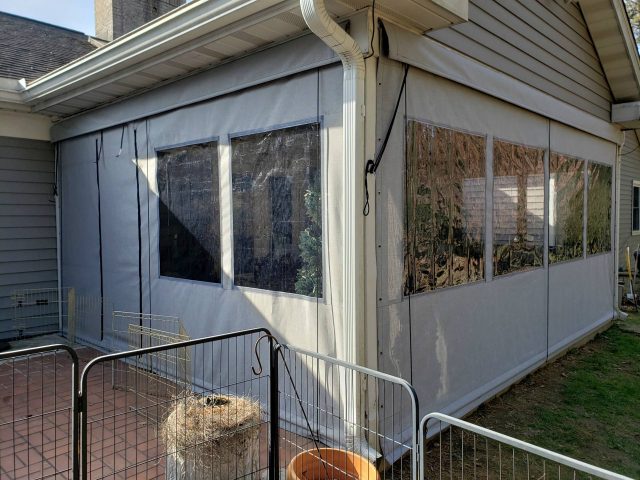Drop curtain porch enclosure - clear vinyl windows - sunbrella