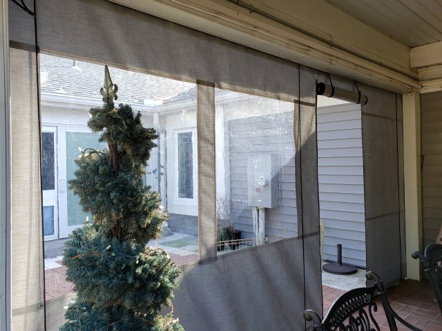 clear vinyl drop curtain enclosure on a residential porch roll up drapes blinds sunbrella fabric canvas lancaster view gray