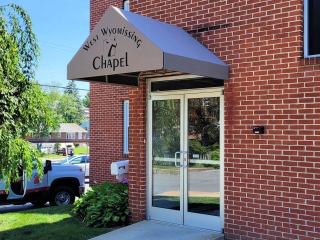 commercial fixed entrance door awning sign graphics lettering canopy lancaster
