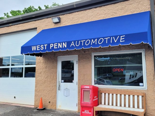 West Penn Automotive commercial storefront awning canopy lettering sign sunbrella fabric canvas facade entrance door