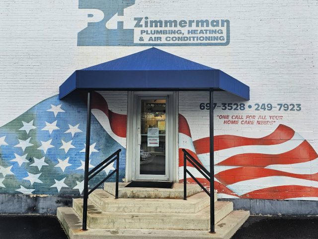 Commercial doorhood awning entrance sunbrella fabric canvas facade canopy cover protect protection sign signage
